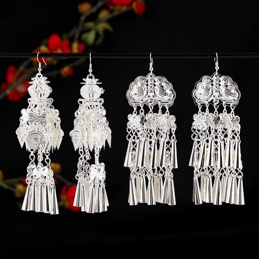 Retro Miao Silver Tassel Earrings - Ethnic Long Bell Dangles, Ideal for Dance & Special Occasions