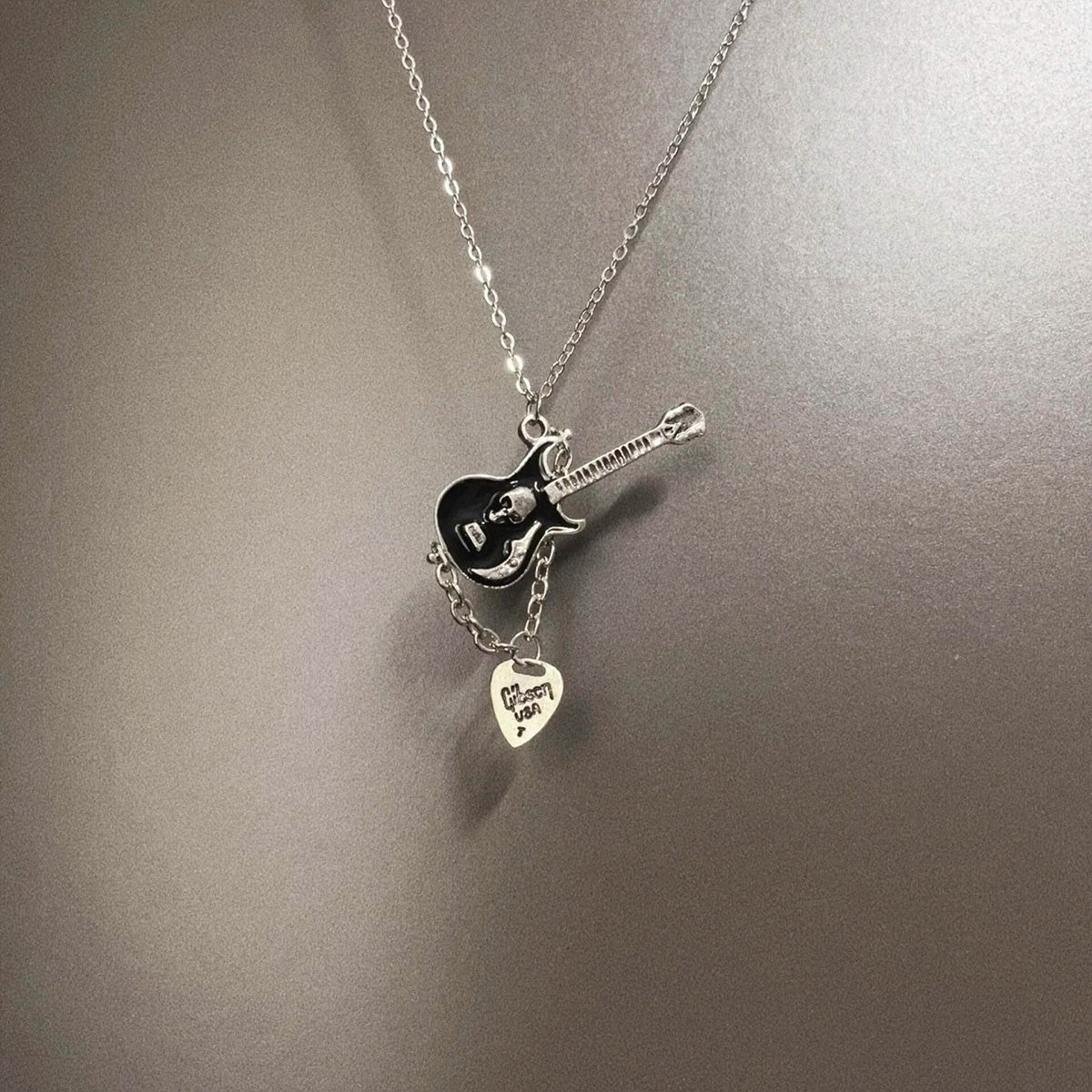 Vintage Retro Skull Guitarist Necklace - Niche Gothic Rock Edgy Unisex Statement Pendant