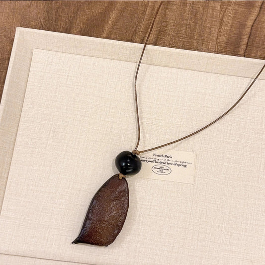 New Chinese Retro Wooden Rice Fruit Pendant - Long Zen Sweater Chain Niche Elegant Neck Jewelry for Women