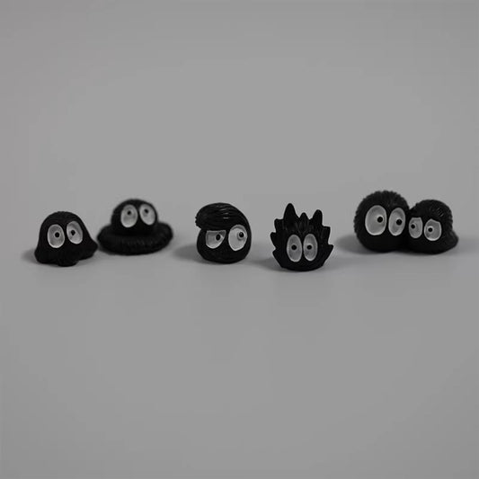 Boredom Buster! A Pile of Weird Little Black Figurines - Quirky Decor for Dull Days